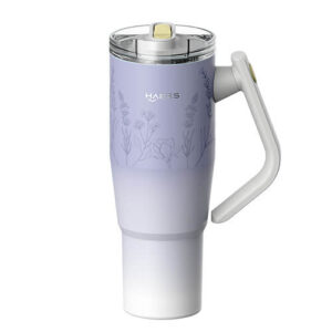 Purple gradient insulated travel mug with floral pattern, lid, and white handle (HAERS logo visible).