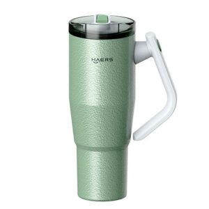 Green Haers insulated travel mug with a white ergonomic handle and snap-on lid, viewed from the side.
