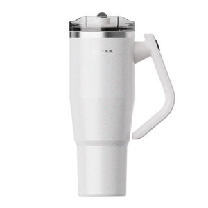 White handheld blender with an ergonomic right-side handle and transparent lid atop a tall body in a white finish.