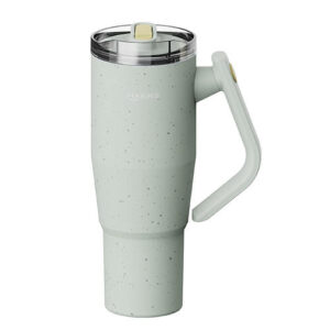 Speckled mint-green reusable travel mug with lid and integrated handle.