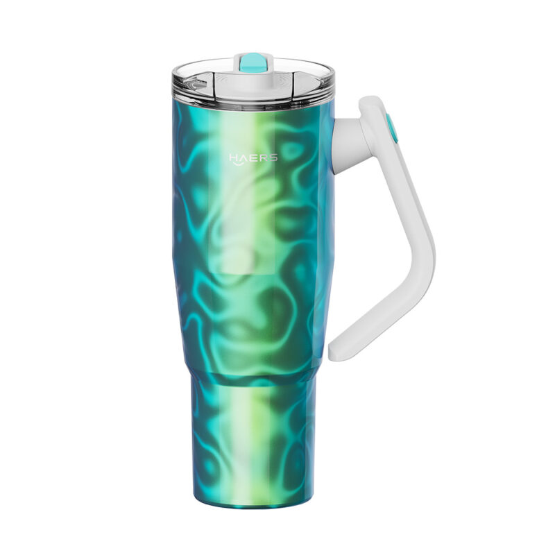 haers insulated travel tumbler with a teal-green swirl finish, clear lid, and white side handle.