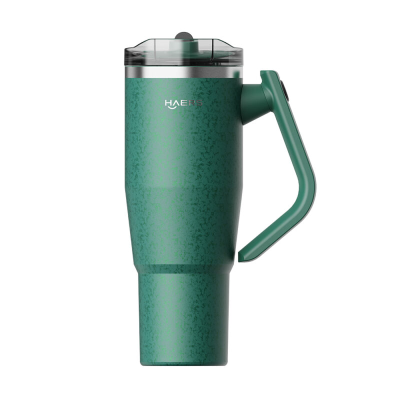 green insulated travel mug with a curved green handle, textured finish, and a clear plastic lid (brand: haers).